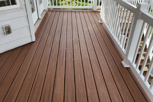 Close-up of composite deck boards with clean lines and low-maintenance wood-look finish